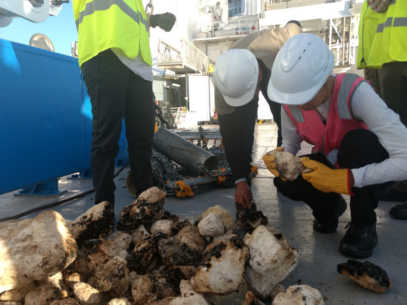 First rocks exhumed from the seafloor sitting on the deck.