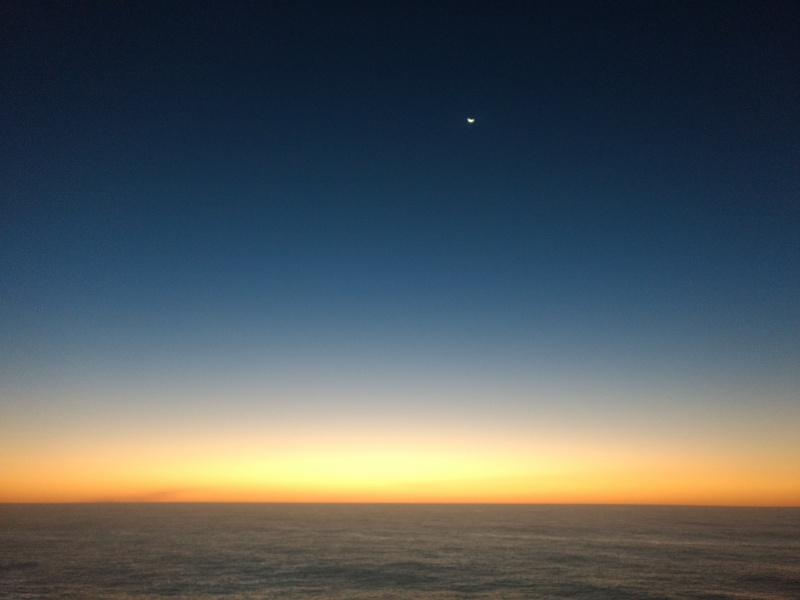 The sunset and moon both in the same shot.